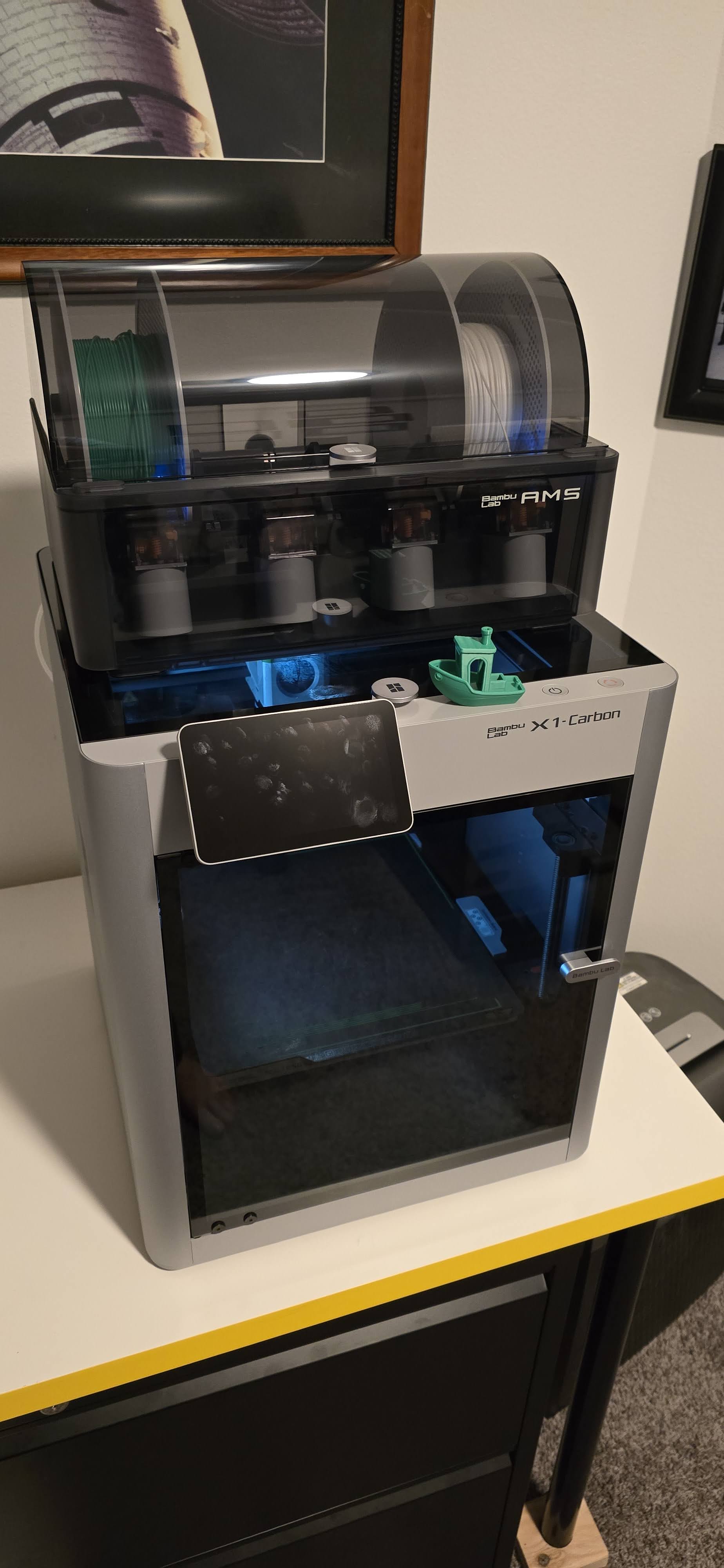 Bambu Lab X1C printer in a real workspace